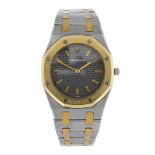 AUDEMARS PIGUET - a lady's Royal Oak bracelet watch. Stainless steel case with yellow metal bezel.