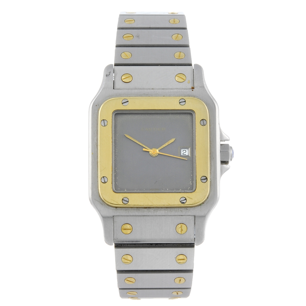 CARTIER - a Santos bracelet watch. Stainless steel case with yellow metal bezel. Numbered 296159725.