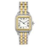 CARTIER - a Panthere bracelet watch. Stainless steel case with yellow metal bezel. Numbered