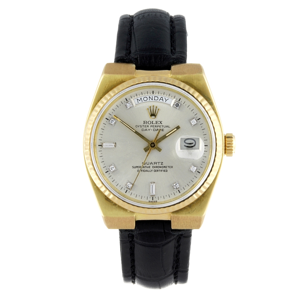 ROLEX - a gentleman's Oysterquartz Day-Date wrist watch. Circa 1979. 18ct yellow gold case with
