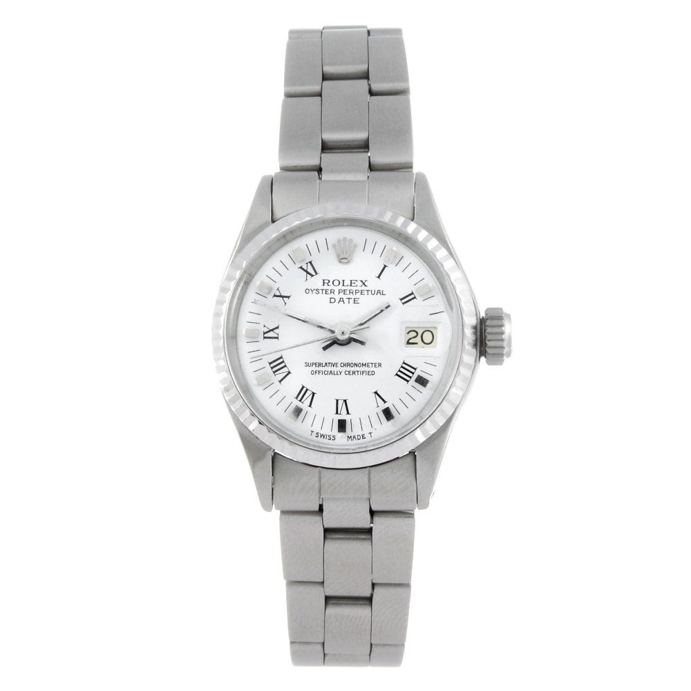 ROLEX - a lady's Oyster Perpetual Date bracelet watch. Circa 1969. Stainless steel case with white