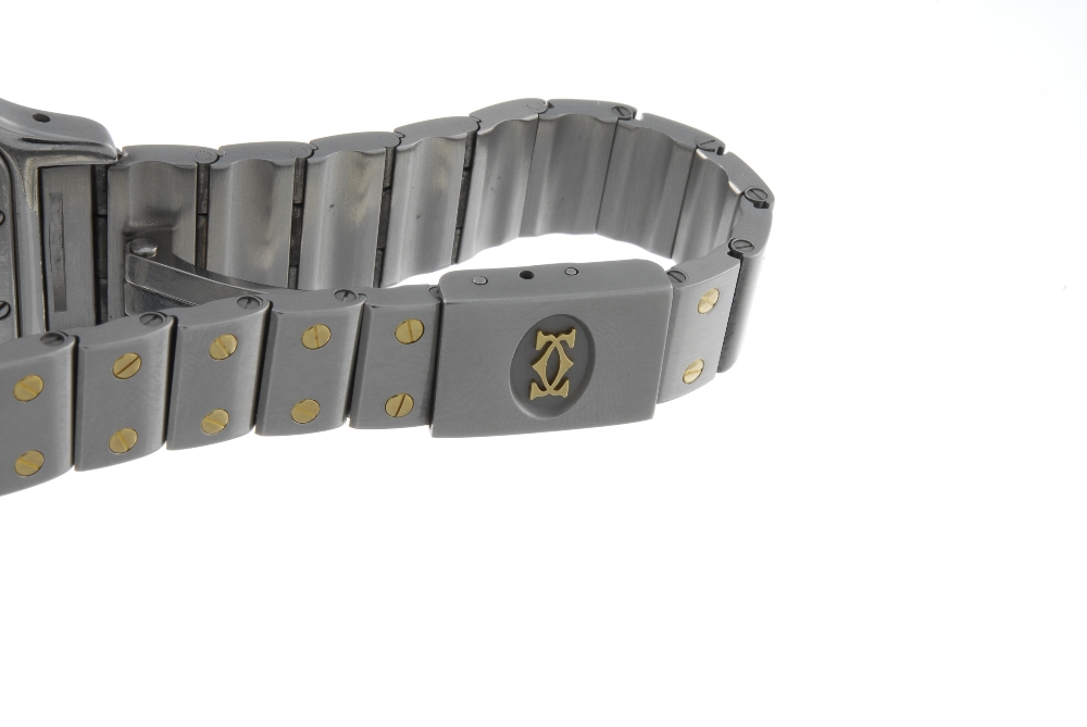 CARTIER - a Santos bracelet watch. Stainless steel case with yellow metal bezel. Reference 35990, - Image 4 of 4