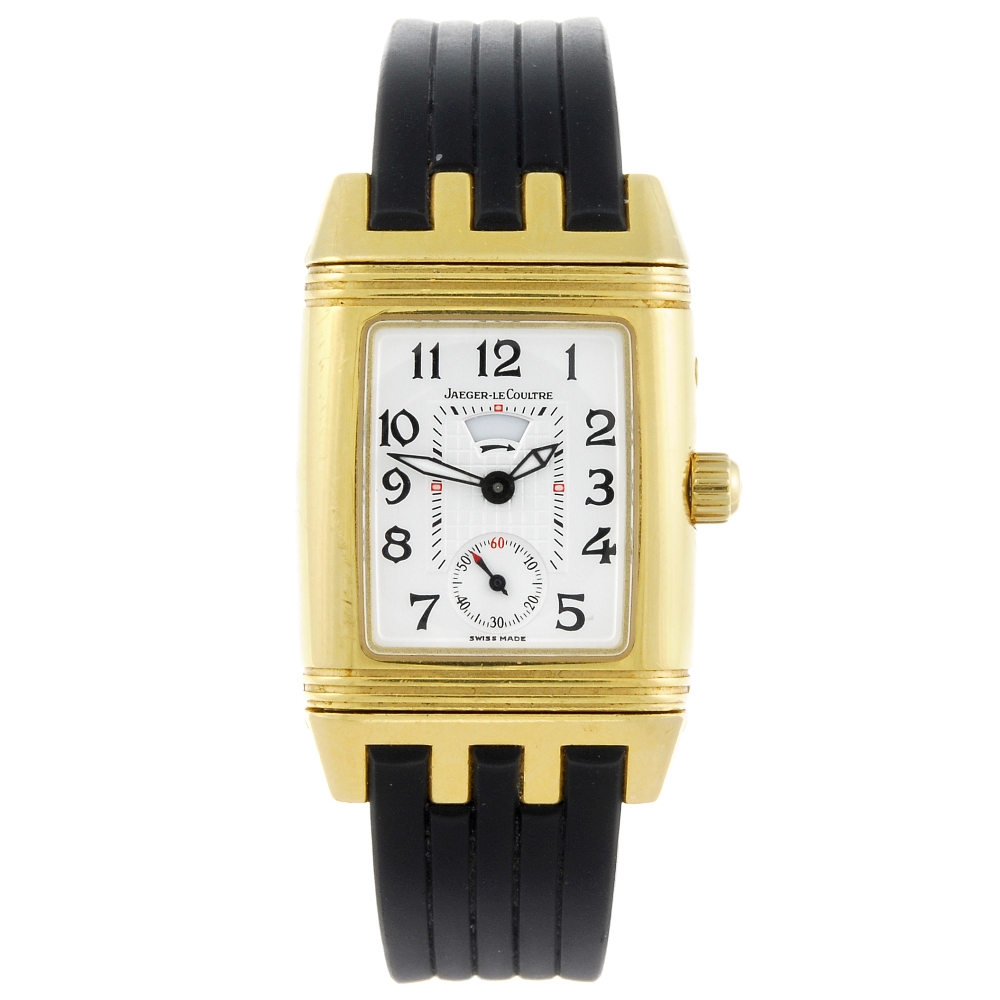 JAEGER-LECOULTRE - a lady's Reverso wrist watch. 18ct yellow gold case, factory diamond set case