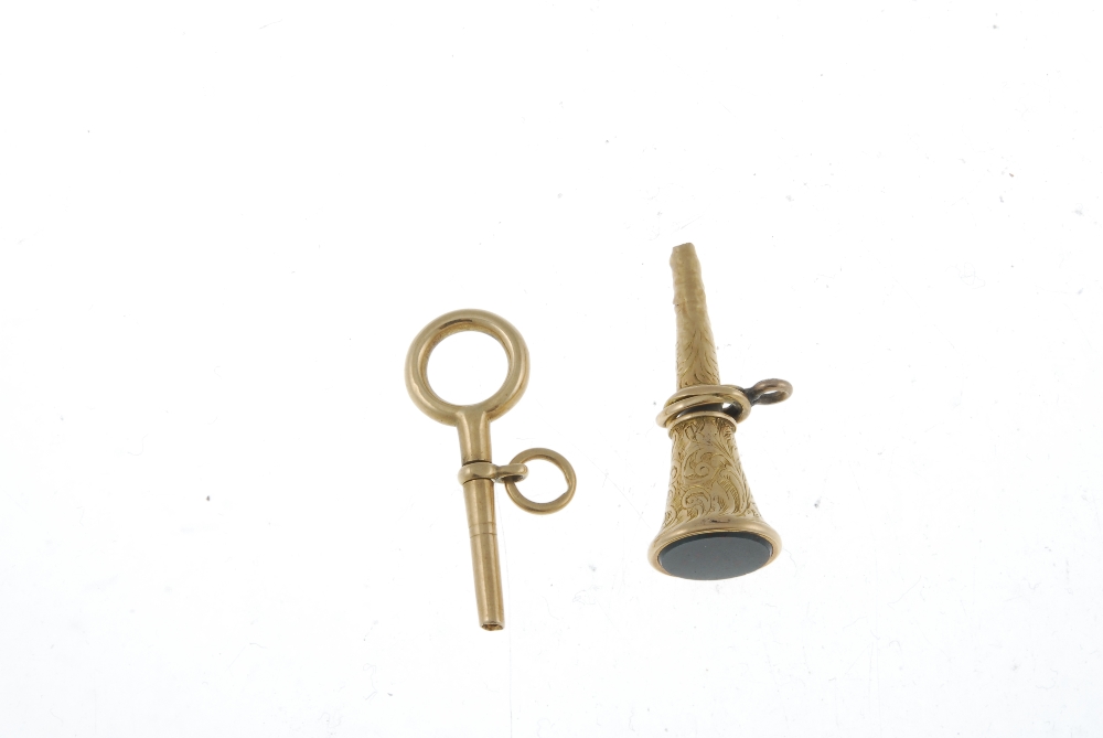 A yellow metal pocket watch key set with bloodstone. 35mm. Together with another yellow metal pocket - Image 3 of 3