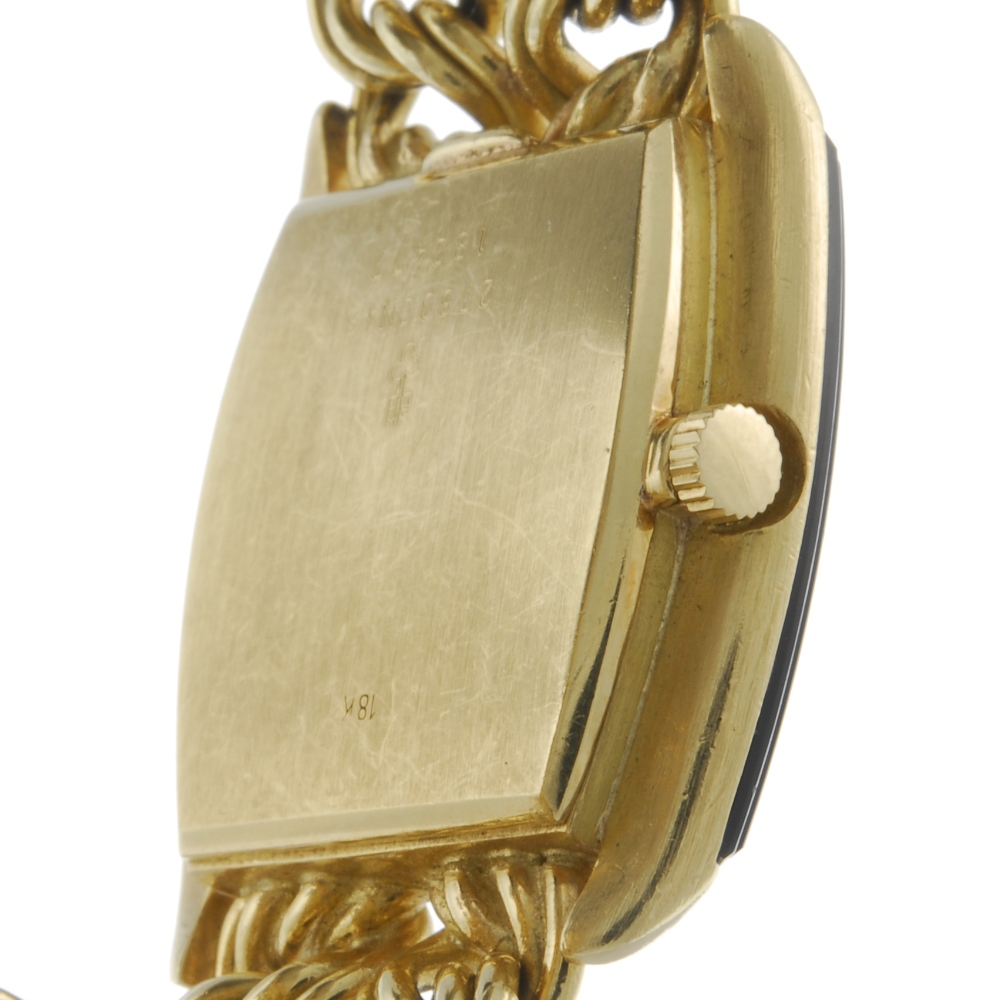 CORUM - a lady's bracelet watch. Yellow metal case, stamped 18k with poincon. Numbered 27630N48 - Image 3 of 4