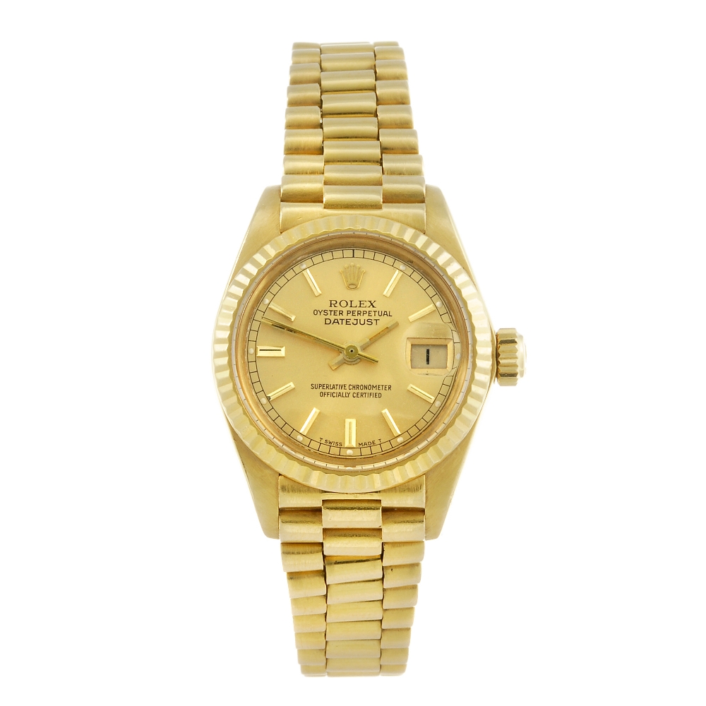 ROLEX - a lady's Oyster Perpetual Datejust bracelet watch. Circa 1982. 18ct yellow gold case with