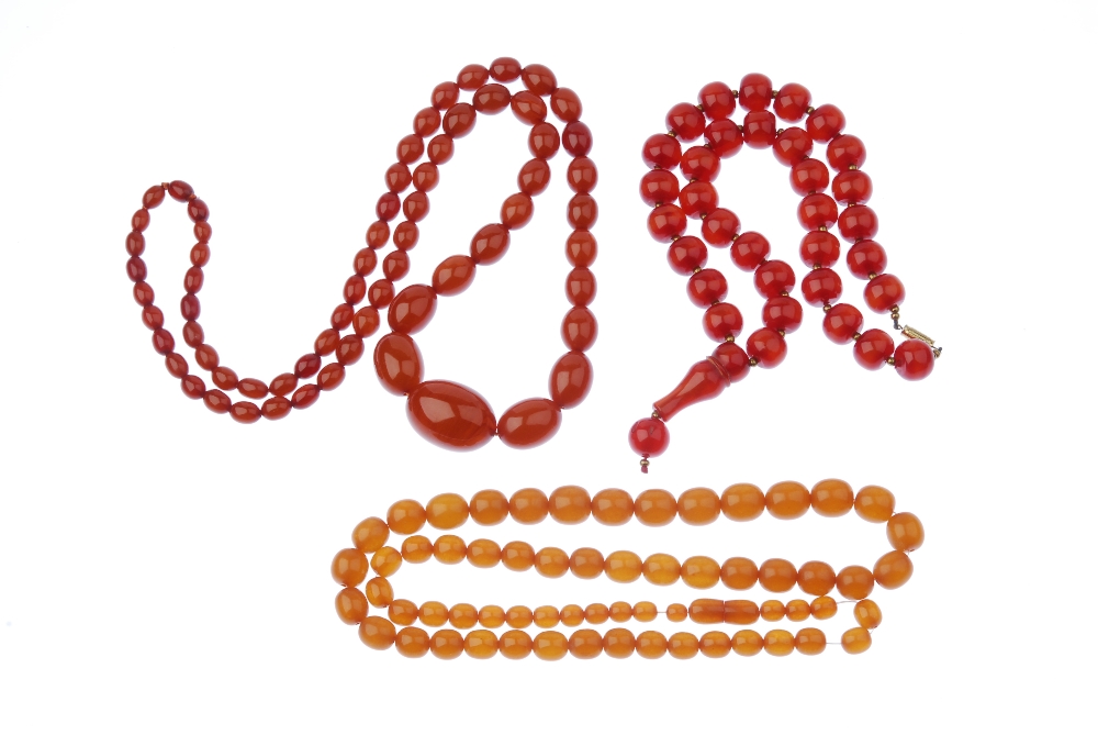 Three plastic bead necklaces. The first designed as a red plastic bead necklace, the flattened - Image 2 of 2