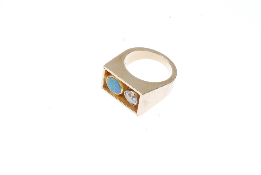 A Scandinavian opal and diamond ring. Designed as a rectangular panel with a circular-cut opal - Image 2 of 3