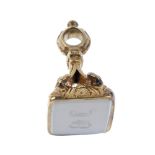 An intaglio fob. The rectangular chalcedony panel engraved with two initials, to the banded and