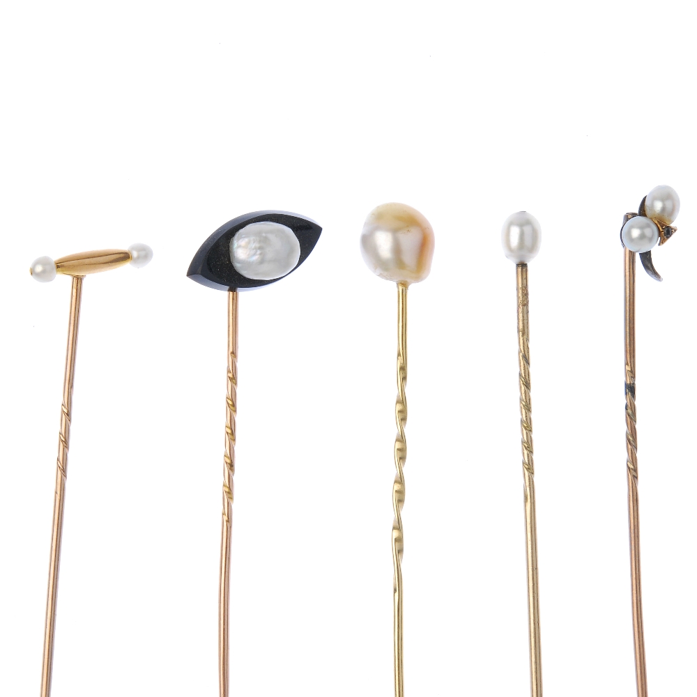 A selection of five pearl stickpins. To include a semi-baroque pearl stickpin, a semi-baroque