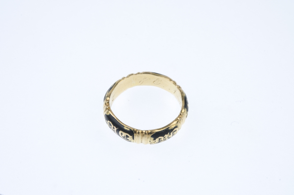 An early Victorian 18ct gold enamel memorial ring. Designed as a series of two letter and black - Image 2 of 3