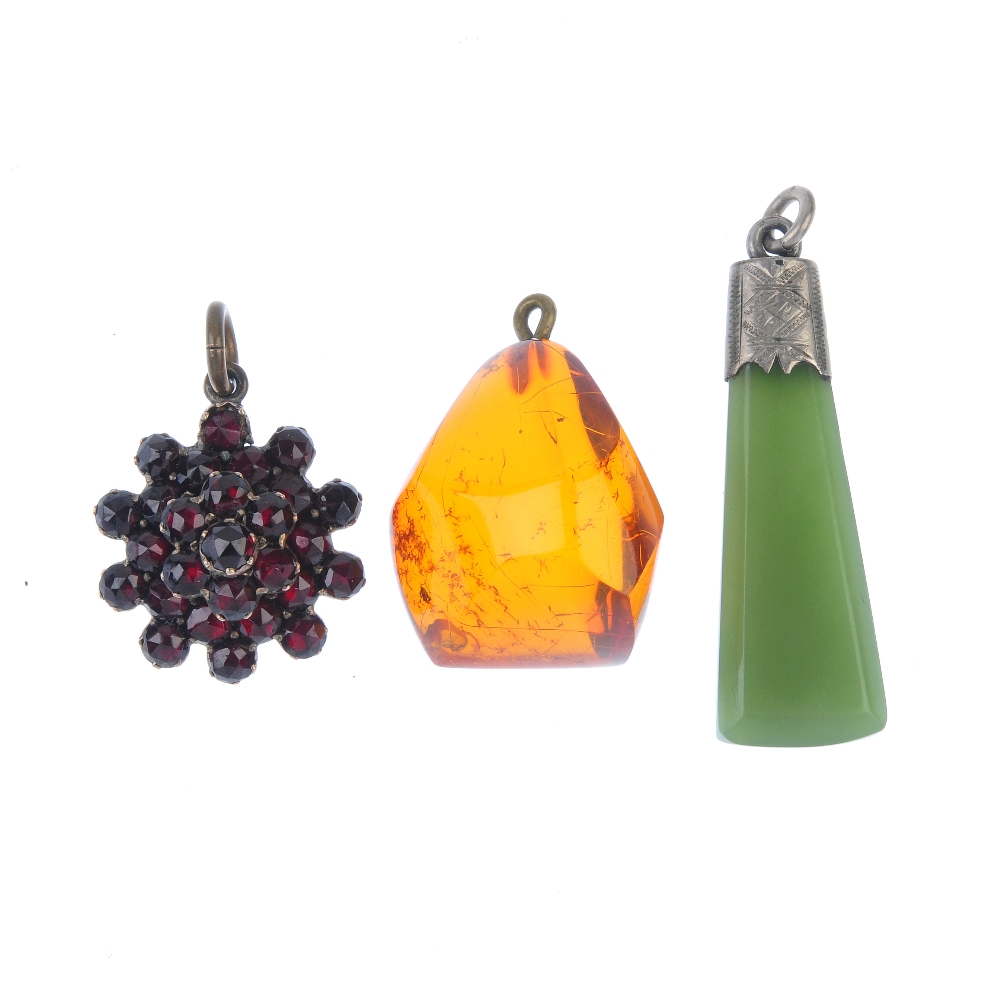 A selection of gem jewellery. To include a pietra dura brooch, the rectangular black hardstone