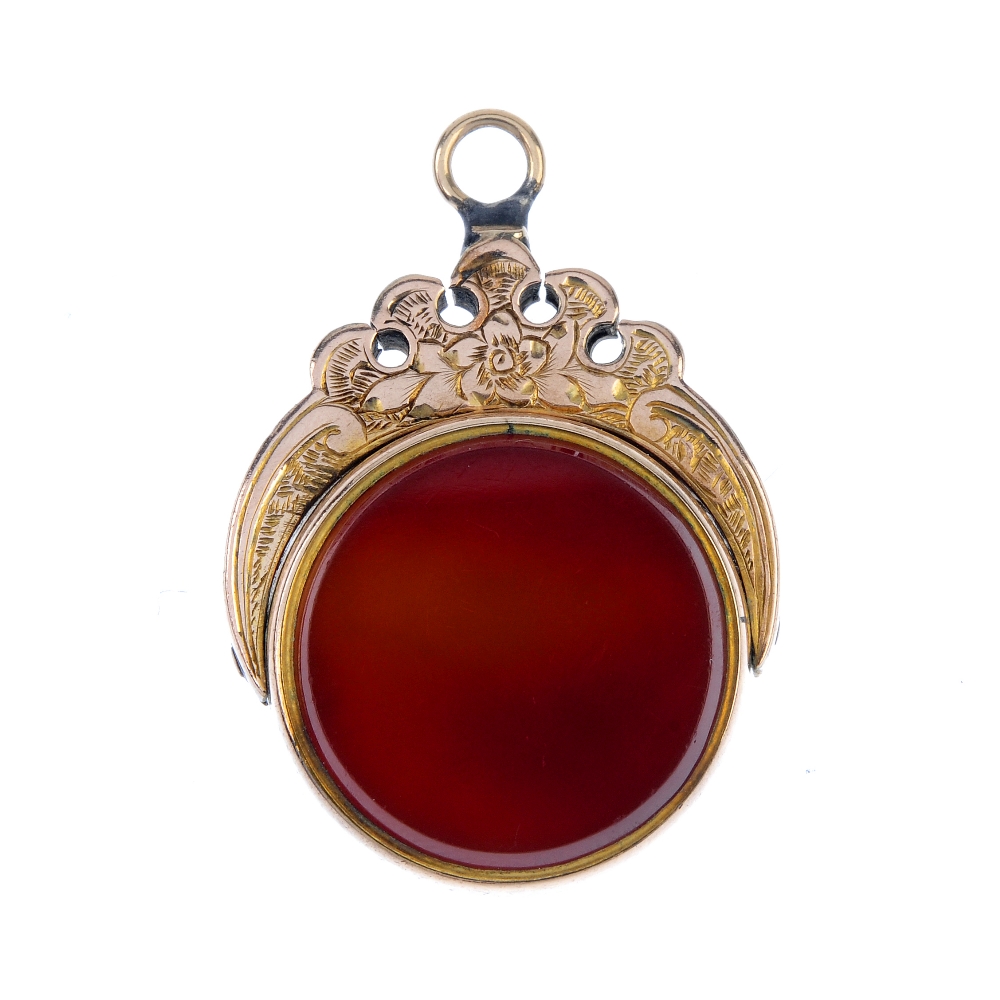 A swivel fob. The circular swivel panel with bloodstone to one side and carnelian to the other, to