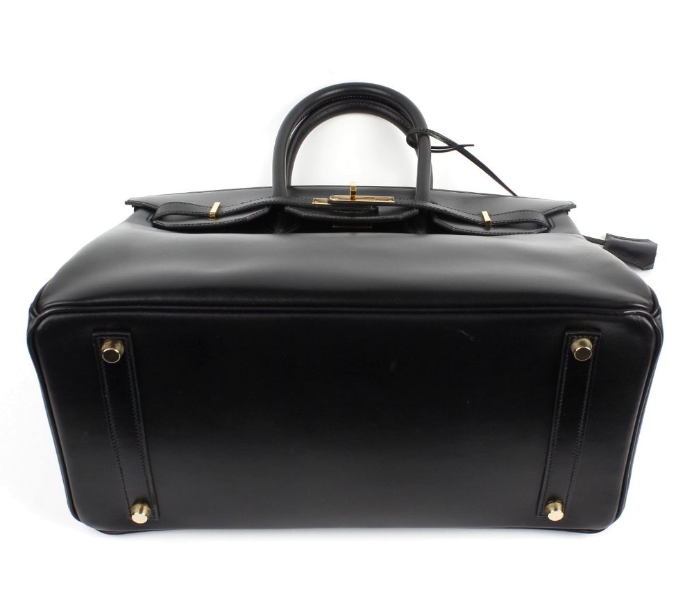 HERMES - a 35cm Birkin handbag. Featuring a smooth black leather exterior, dual rolled handles, - Image 4 of 9