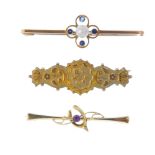 Five late 19th to early 20th century gold brooches. To include one designed as a bar brooch with