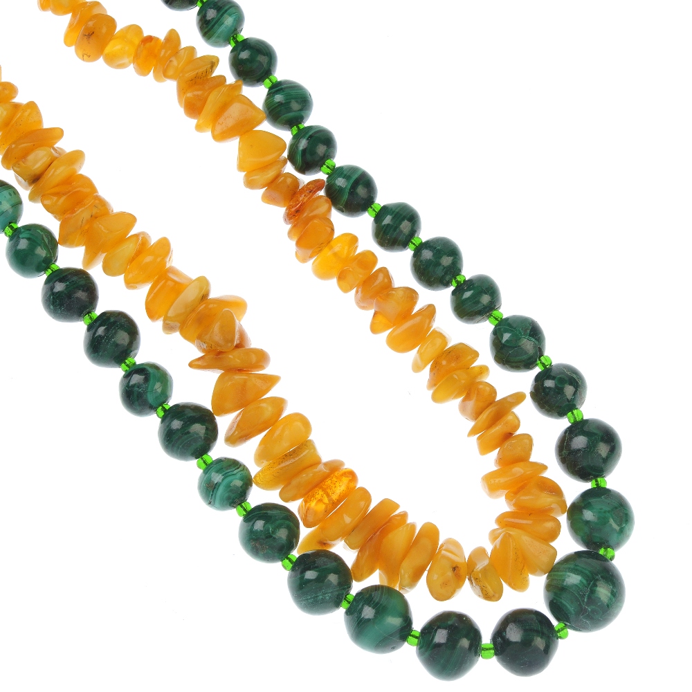 A large selection of gem jewellery. To include a selection of malachite bangles, a modified amber
