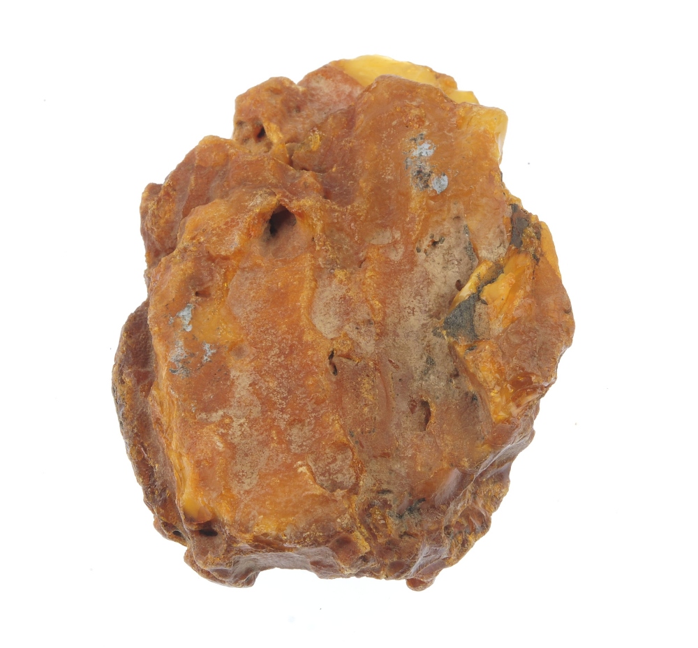 A large piece of rough amber. Of varying colour throughout, measuring 14 by 9 by 5cms. Weight 299. - Image 4 of 4