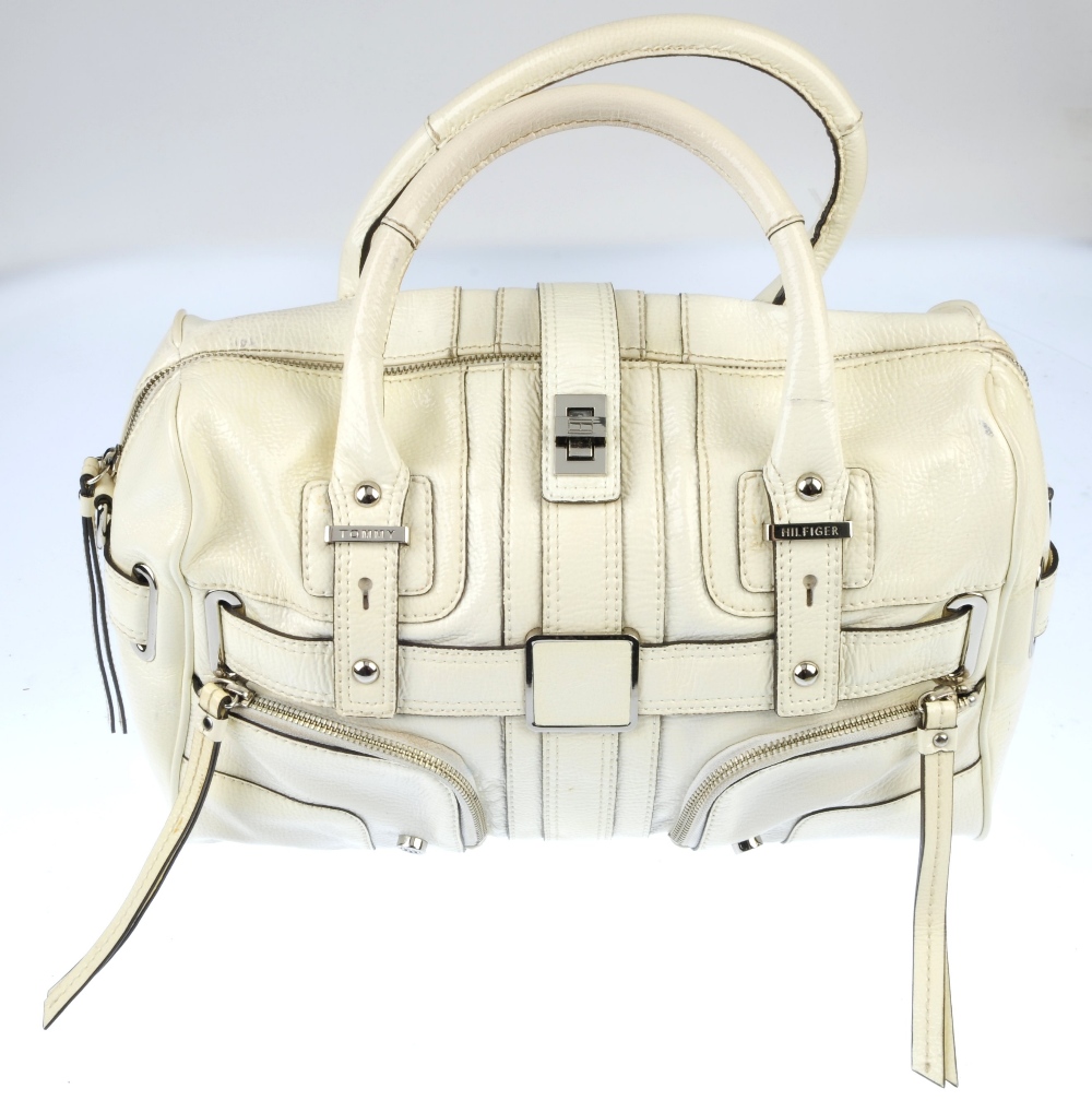 Two designer bags. To include a small cream leather shoulder bag by Givenchy, featuring three - Image 2 of 5