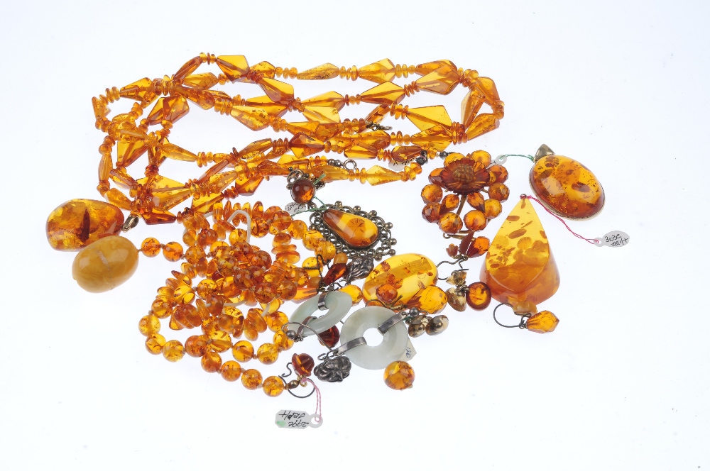 A selection of mainly amber jewellery. To include three vari-shape amber bead necklaces, five - Image 2 of 2