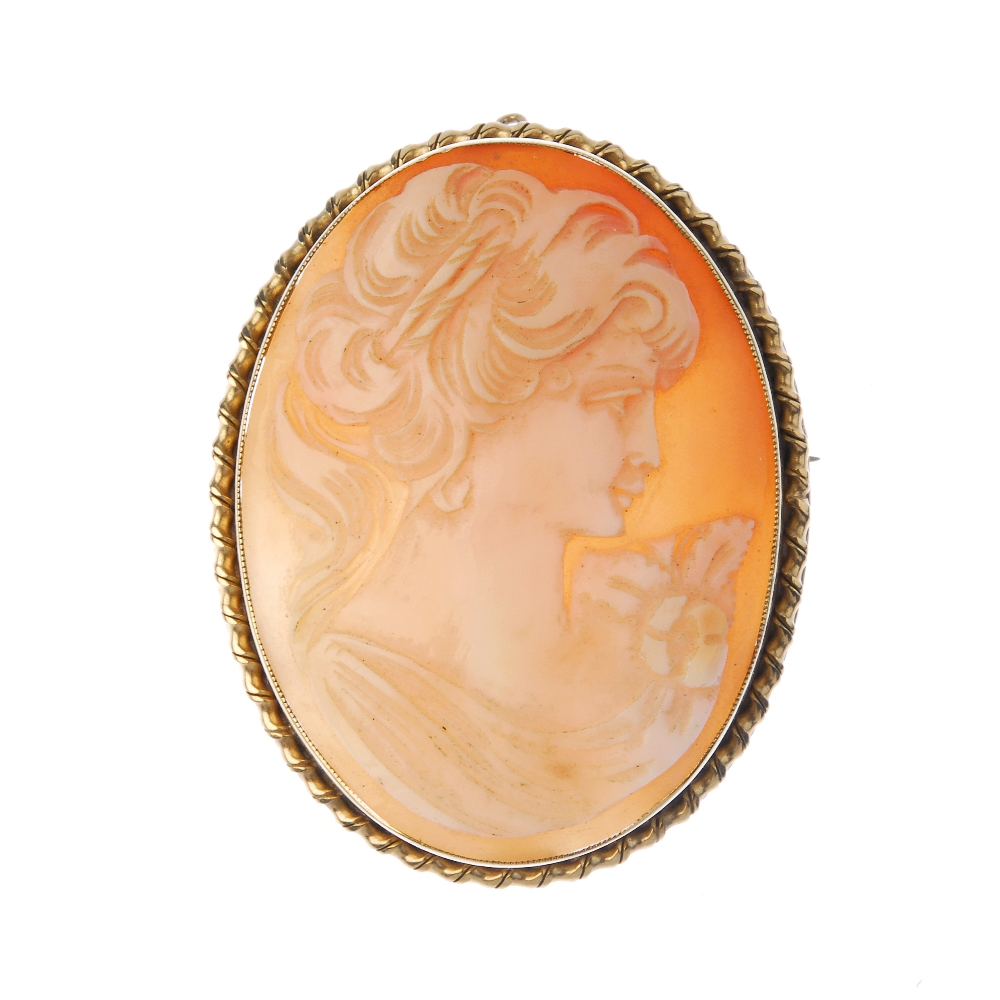 A 9ct gold cameo brooch. The shell depicting a lady in profile. Hallmark for Birmingham, 1949.