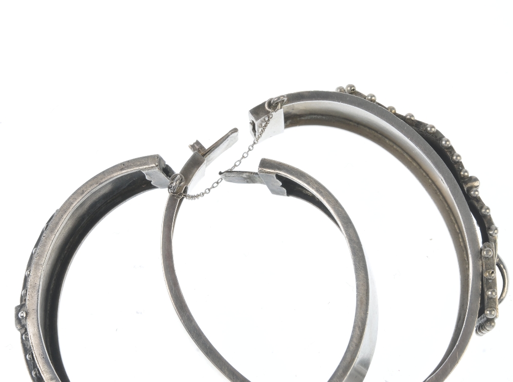 Two late Victorian silver hinged bangles. Both designed as buckles, the first with engraved ivy - Image 3 of 3
