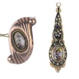Two items of mid 19th century jewellery. The first of pear-drop shape and decorated in black and