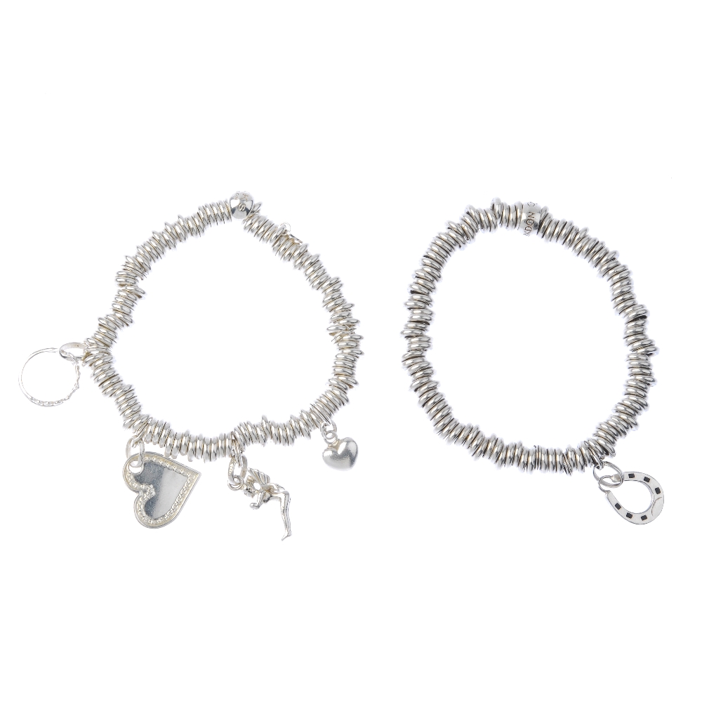 Five items of silver designer jewellery. To include two 'Sweetie' charm bracelets and a plain band