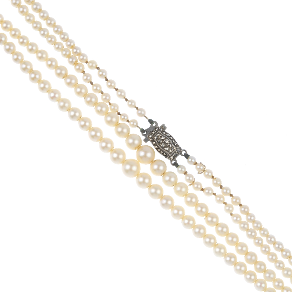 A cultured pearl necklace, together with a selection of imitation pearl necklaces. The cultured