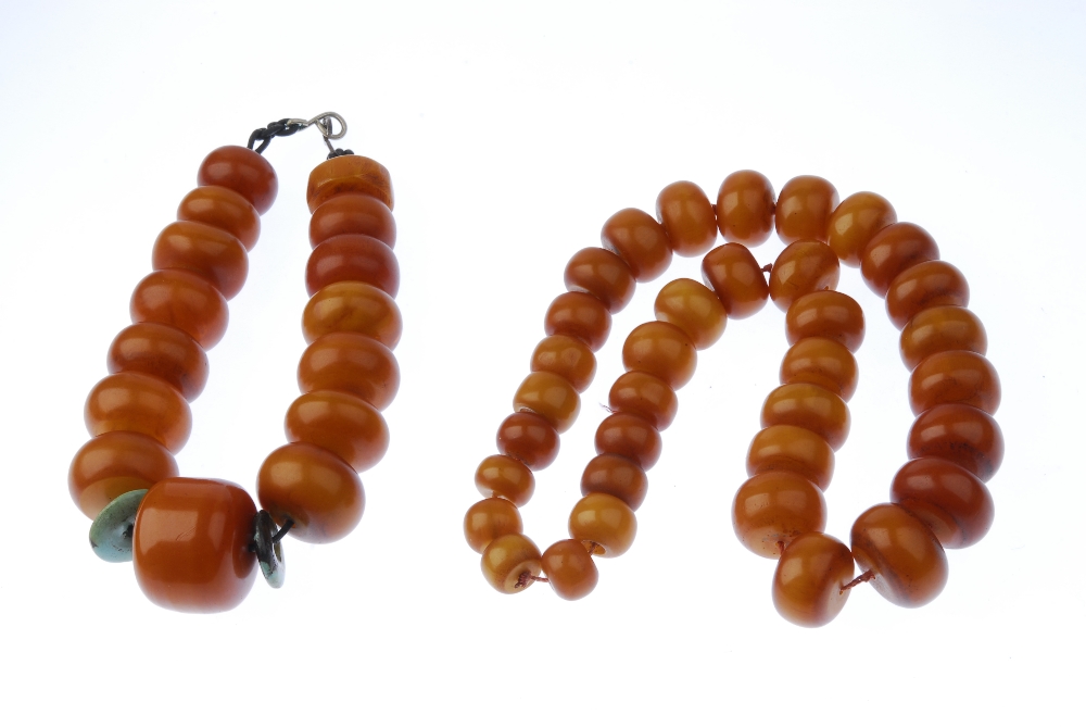 Two large plastic bead necklaces. The first designed as thirty-five graduated bouton-shape beads, - Image 2 of 2