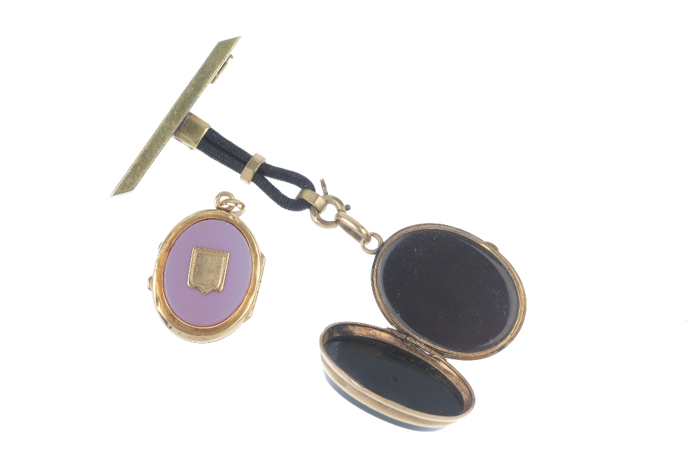 Two hardstone lockets. The first designed as an onyx panel oval-shape locket, the front with a - Image 2 of 2