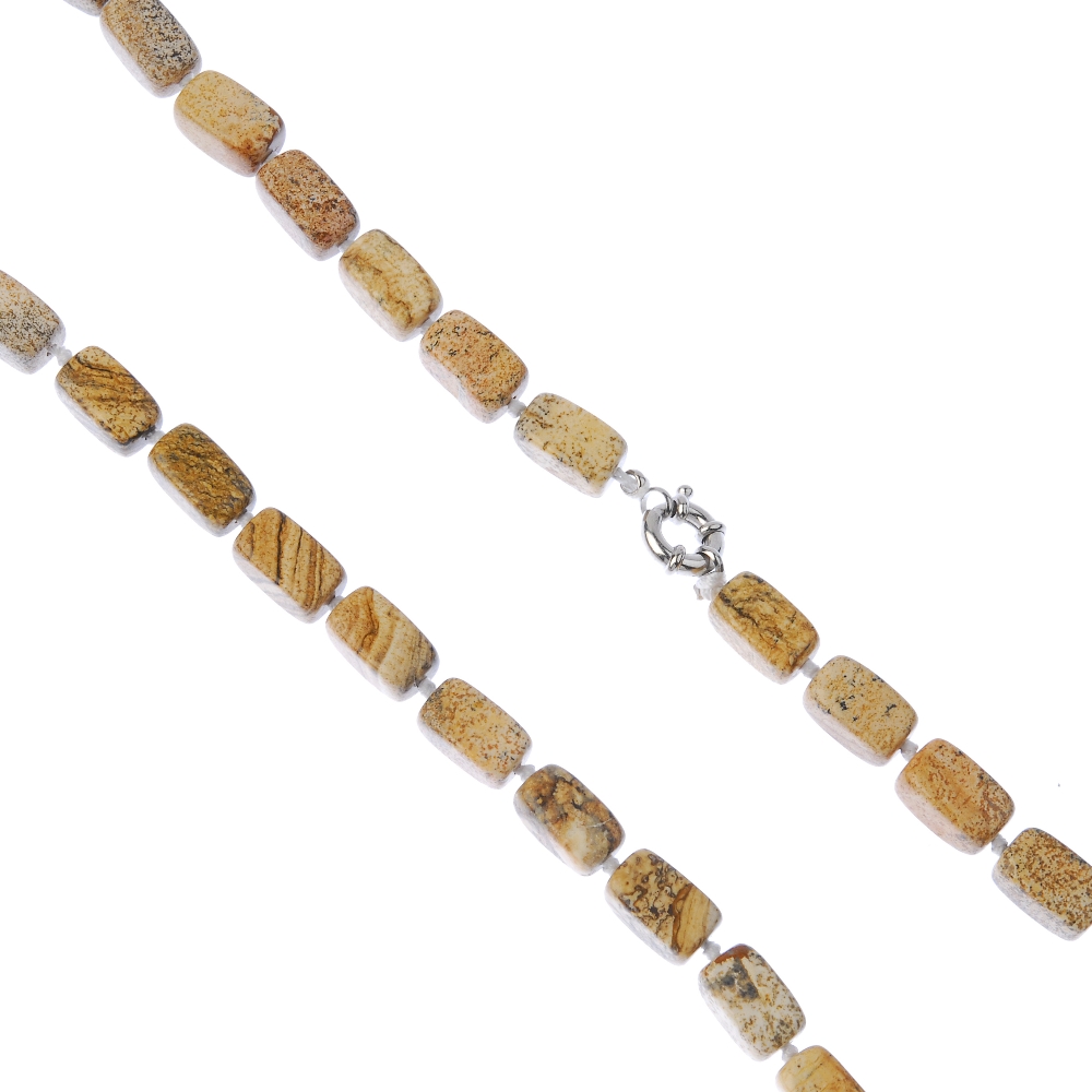 A selection of gem and glass necklaces. To include a tiger's-eye necklace, the faceted octagonal-
