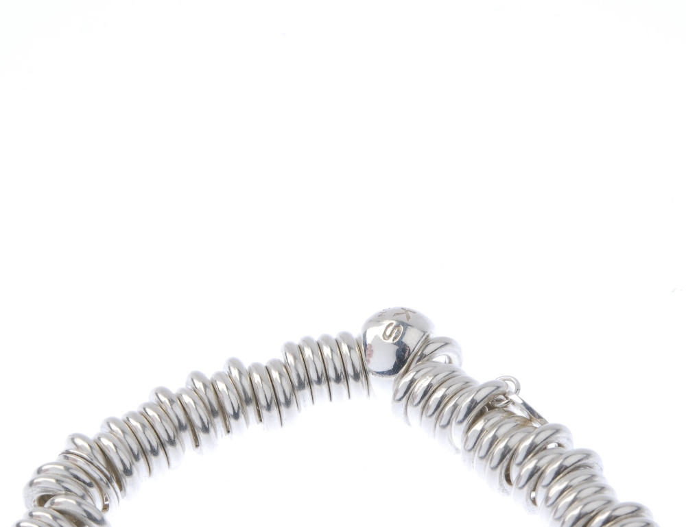 Five items of silver designer jewellery. To include two 'Sweetie' charm bracelets and a plain band - Image 7 of 9