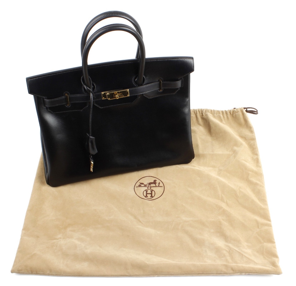 HERMES - a 35cm Birkin handbag. Featuring a smooth black leather exterior, dual rolled handles, - Image 5 of 9