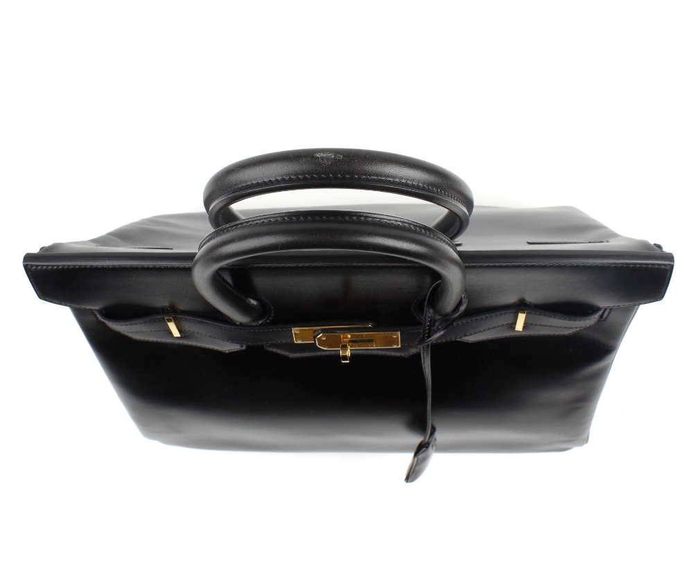 HERMES - a 35cm Birkin handbag. Featuring a smooth black leather exterior, dual rolled handles, - Image 7 of 9