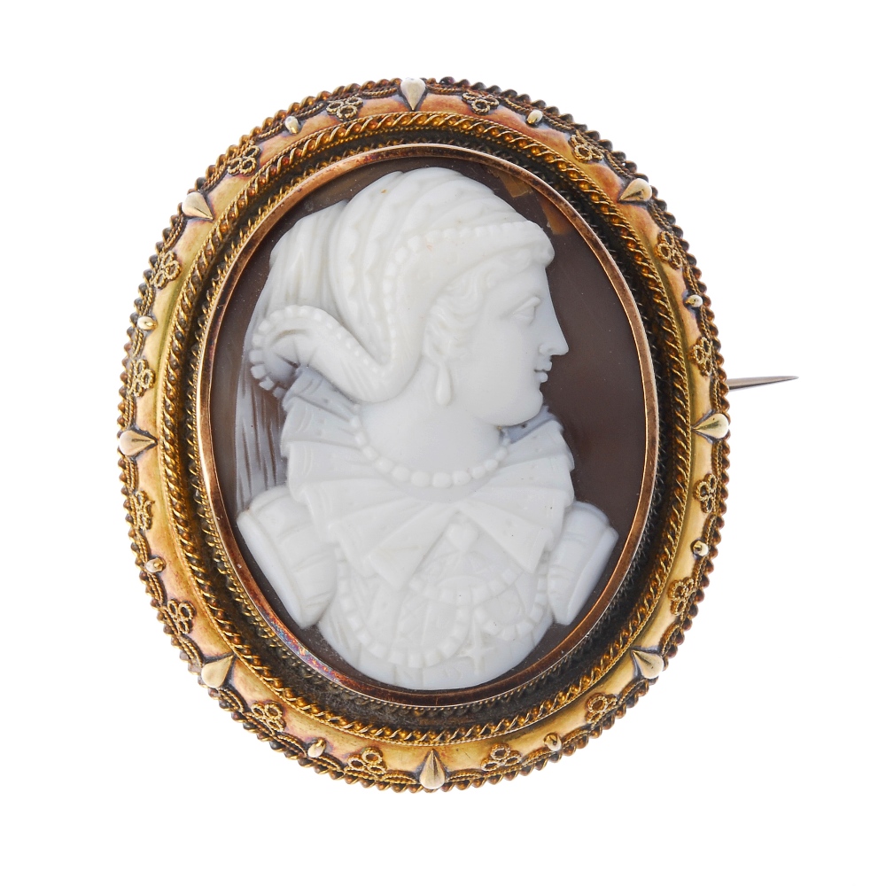 A shell cameo brooch. The shell carving possibly depicting Mary Queen of Scots, to the cannetille
