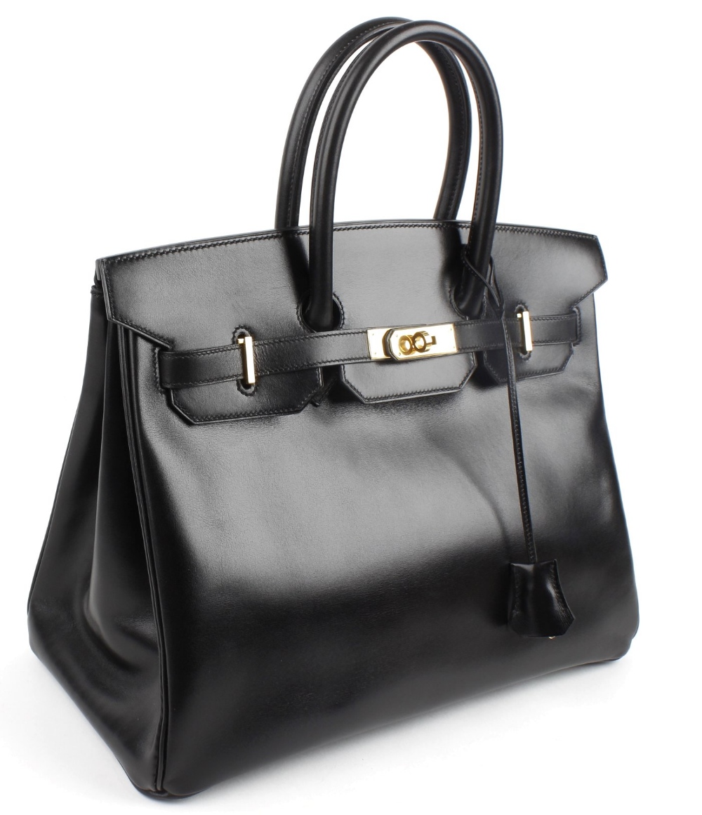 HERMES - a 35cm Birkin handbag. Featuring a smooth black leather exterior, dual rolled handles, - Image 2 of 9