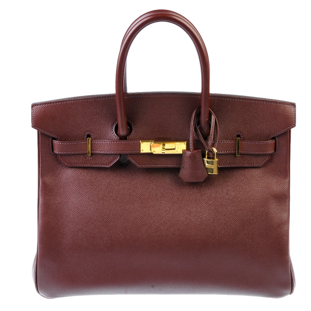 HERMES - a Togo 35cm Birkin handbag. Featuring a brown pebbled Togo leather exterior, dual rolled