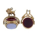 Two swivel fobs. The first of circular outline, with carnelian to one side of the swivel panel and