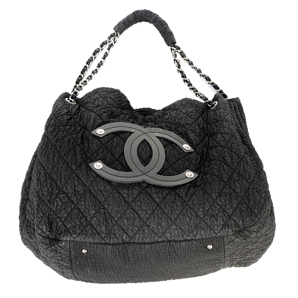 CHANEL - a Quilted CC Tote. Featuring a black wrinkled nylon exterior with quilted diamond