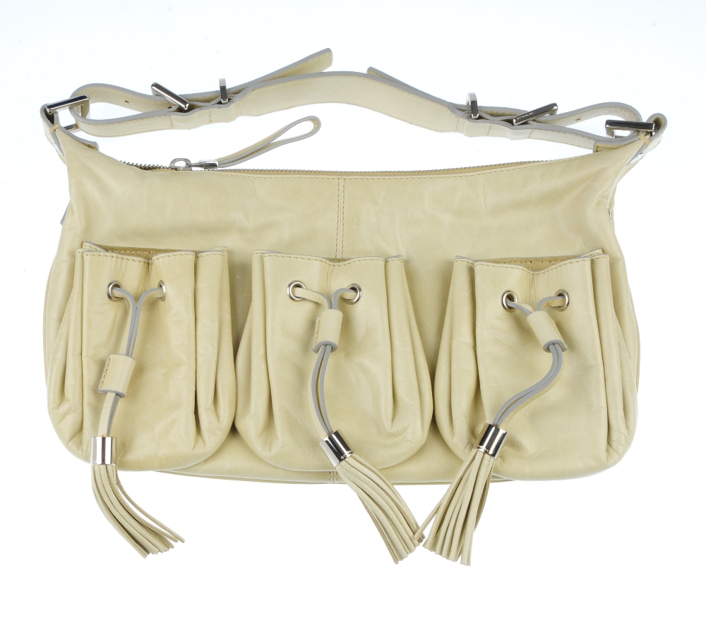 Two designer bags. To include a small cream leather shoulder bag by Givenchy, featuring three - Image 3 of 5