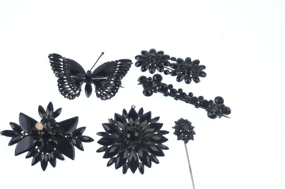A selection of late 19th century French jet jewellery. To include a floral pendant, a butterfly - Image 2 of 2
