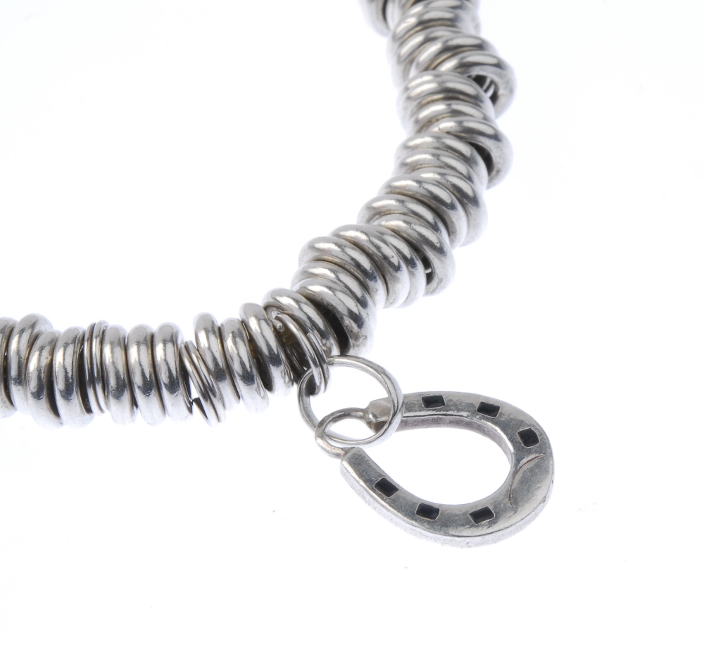 Five items of silver designer jewellery. To include two 'Sweetie' charm bracelets and a plain band - Image 9 of 9