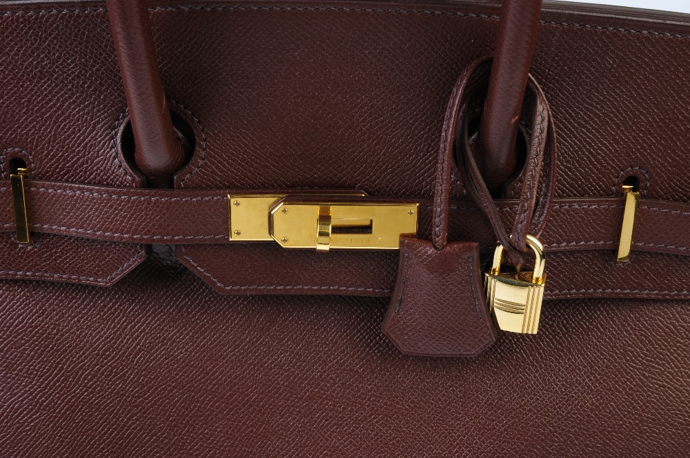 HERMES - a Togo 35cm Birkin handbag. Featuring a brown pebbled Togo leather exterior, dual rolled - Image 9 of 13