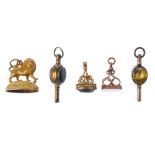A selection of three fobs and two watch keys. The first with stone deficient, the pedestal