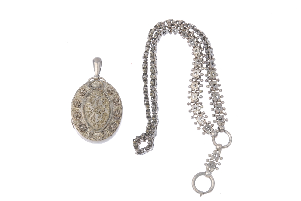 A late Victorian silver locket and collar. The oval-shape locket, with engraved and applied floral - Image 3 of 3