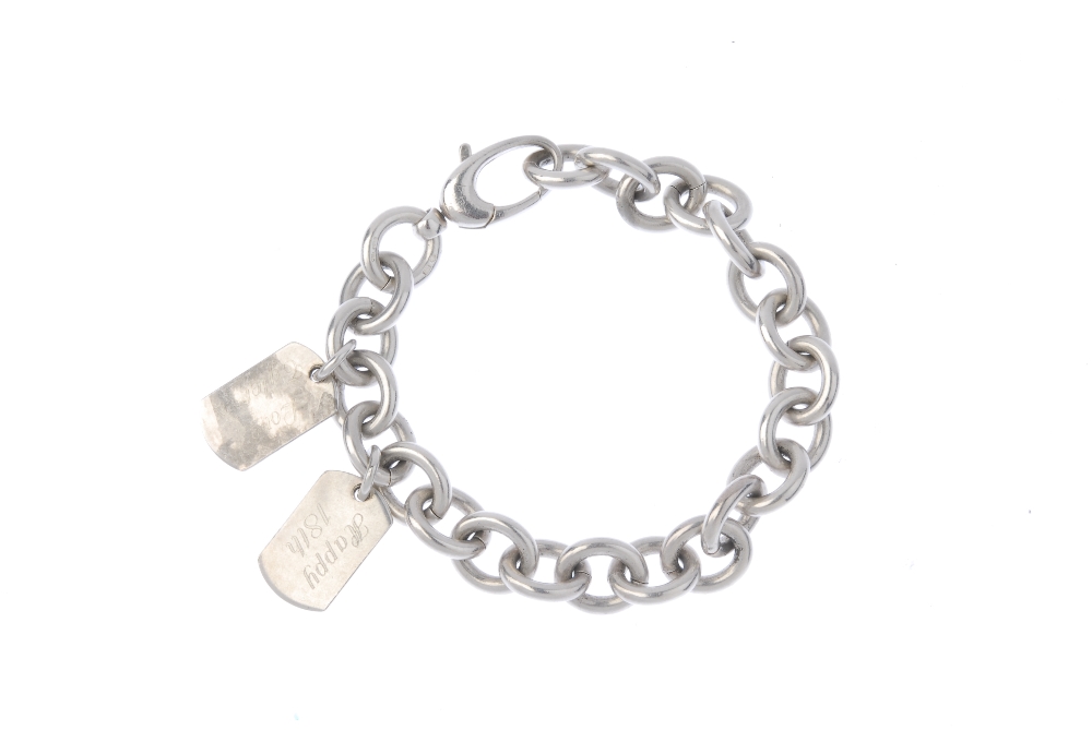 GUCCI - a silver bracelet. The belcher-link bracelet suspending two 'Gucci' engraved dog tags, - Image 2 of 2