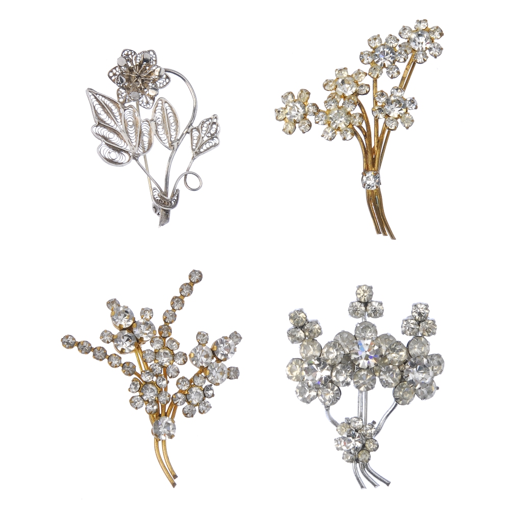 A selection of costume brooches. To include brooches of floral design. Due to the amount of items in
