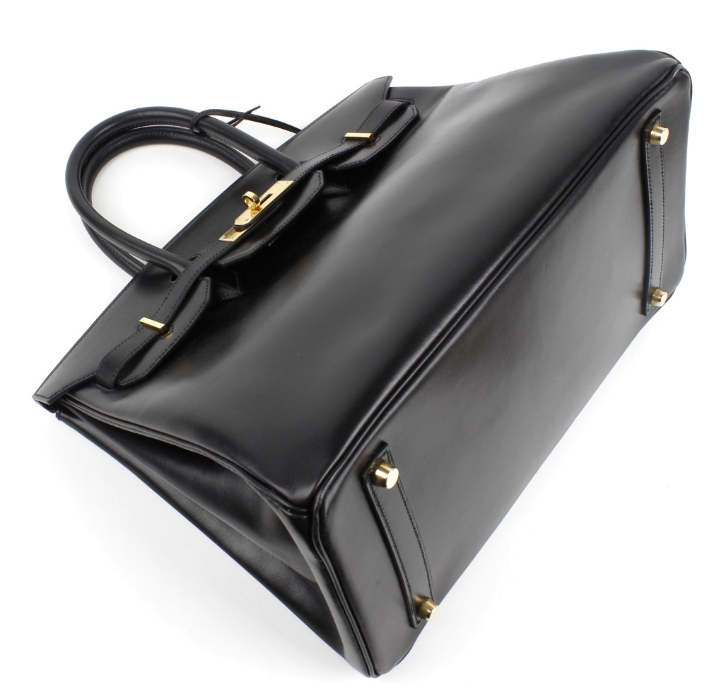 HERMES - a 35cm Birkin handbag. Featuring a smooth black leather exterior, dual rolled handles, - Image 6 of 9