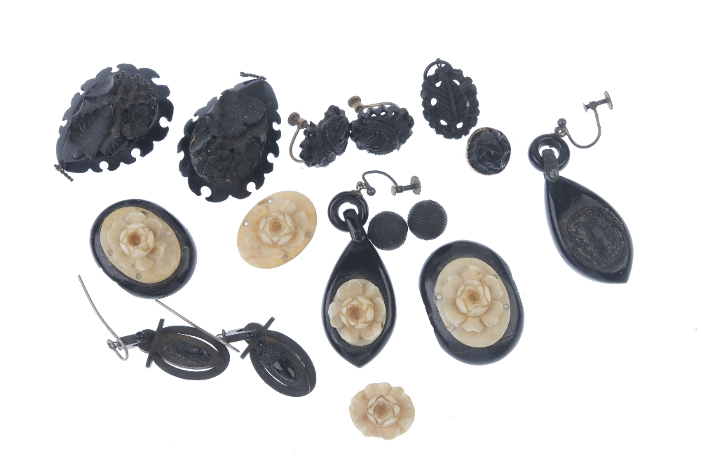 A selection of late 19th century jet, vulcanite and ivory jewellery, panels and pieces. To include a - Image 2 of 2