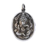 An Indian locket. The front designed as the Hindu deity Ganesha, to the plain surmount loop and